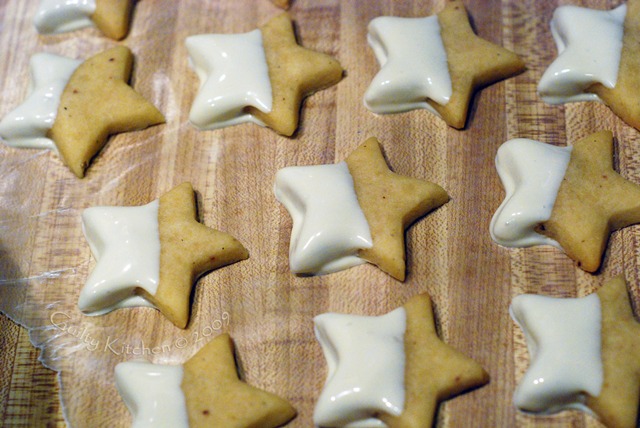 Eggnog Shortbread stars dipped in white chocolate